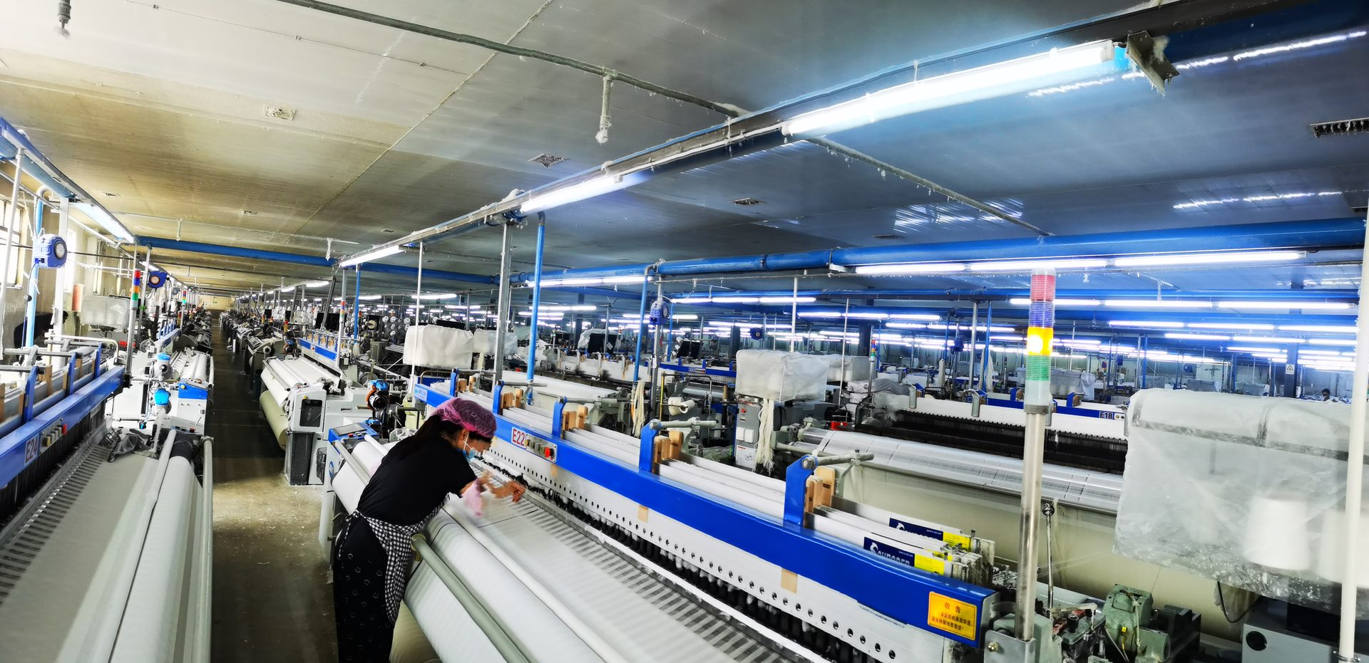 Row of weaving machines